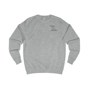 May include: A heather grey sweatshirt with the text "Enjoy the Silence" printed on the front.