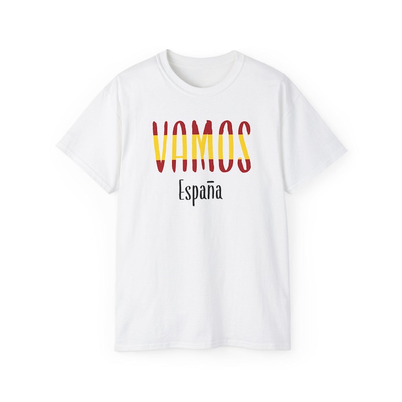 May include: White t-shirt with the text "VAMOS" in red and yellow, with the word "Espa&ntilde;a" underneath.
