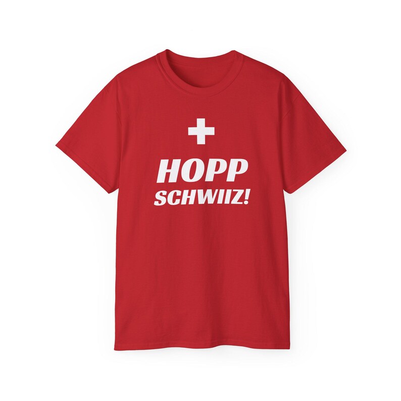 May include: Red t-shirt with a white Swiss flag and the text "HOPP SCHWIIZ!"
