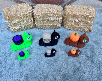 Spooky Halloween Articulated Snails | Skull Snail | Pumpkin Snail | Cauldron Snail that Glows Green | Stress Relief | Fidget Toy