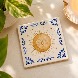 Posavasos de cerámica con diseño de cara de sol