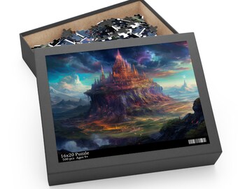 Op de afbeelding: Een zwarte doos met een 500-delige puzzel erin. De puzzel is van een fantasie kasteel op een klif met een kleurrijke lucht. De doos zegt "16x20 Puzzle 500 pcs Ages 9+"