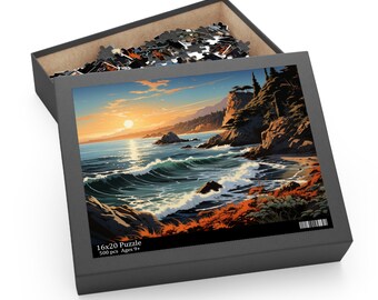 Op de afbeelding: Een puzzel van 500 stukjes met een zonsondergang boven een rotsachtige kustlijn met golven die op de kust breken. De doos is zwart met de tekst "16x20 Puzzle 500 pcs Ages 9+"