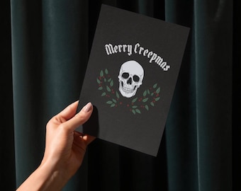 Merry Creepmas Gothic Holiday Greeting Cards | Skeleton & Festive Floral Design