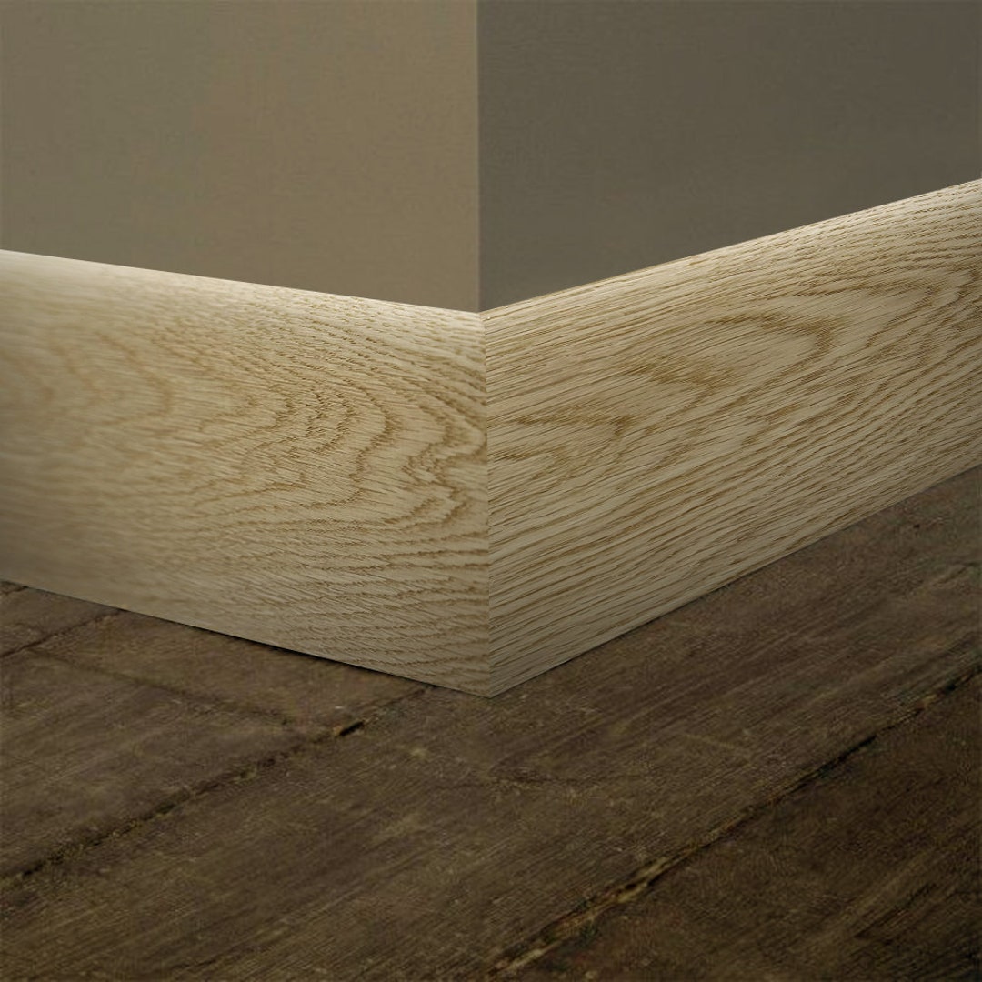 Unfinished White Oak Baseboard Moulding 9/16 in X 5 1/4 in X 7 Ft Solid