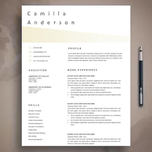 May include: A professional resume template featuring the name Camilla Anderson at the top, with sections for profile, education, work experience, and skills. The layout includes a light beige header accent and a black pen placed to the right.