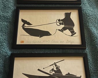 Conjunto de tres grabados en madera inuit del siglo XX, obra de Henry Napartuk (1932-1985).
