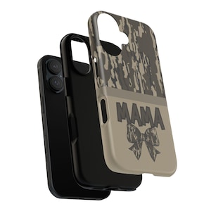 May include: A phone case with a camouflage pattern on the top half and the word "MAMA" with a bow graphic on the bottom half. The case is tan and black.