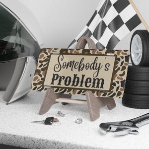 Dixie Camo 'Somebody's Problem' Aluminum License Plate afbeelding 2