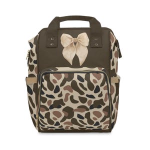 Dixie Camo Bow Backpack: Nylon Travel Coquette Diaper Bag image 1