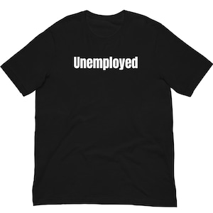 May include: Black t-shirt with the word "Unemployed" printed in white, centered across the chest. The shirt has short sleeves and a crew neck.