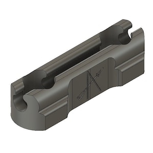 May include: A gray plastic connector with two openings and a groove in the center. The connector has a textured surface and a small logo on the side.