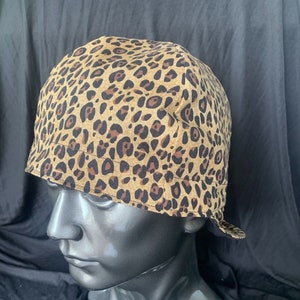 Quality, pre-shrunk, handmade welding caps!  Leopard Print