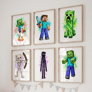 May include: A set of six framed wall art prints featuring Minecraft characters including a baby zombie on a chicken, Steve with a sword, a green Creeper, a skeleton with a bow, an Enderman, and a zombie, all with colourful watercolour-style splashes.