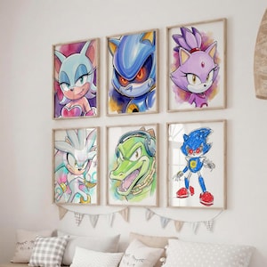 Puede incluir: Conjunto de seis impresiones artísticas enmarcadas con ilustraciones coloridas de personajes de Sonic the Hedgehog. Cada impresión muestra un personaje diferente con ilustraciones vibrantes al estilo acuarela, sobre un fondo blanco.