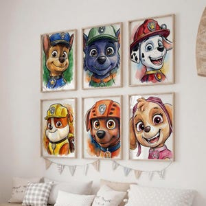 A wall with six framed illustrations of cartoon animal characters, including a police dog, a wolf, a Dalmatian, a brown dog, a yellow dog, and a pink dog.