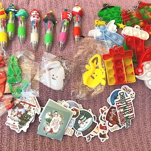 Christmas mystery favor Bags. Lot of  10, 15 or 20. pixie dust, party favors, cruise Fish Extender Bags.  Items may vary per bag.