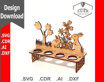 May include: Wooden Easter egg holder with a bunny rabbit and flower design. The holder has five slots for eggs and is decorated with a floral pattern.