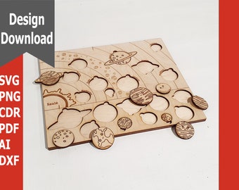 May include: A wooden solar system puzzle with cut-out planets and a sun. The planets are separate pieces that fit into the cut-outs. The sun has the word "Soleil" written on it.