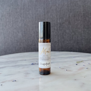 Olejek eteryczny w kulce | Grejpfrut w organicznym oleju jojoba | 10 ml