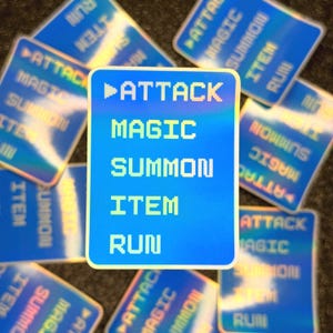 May include: A blue holographic sticker with the words "Attack", "Magic", "Summon", "Item", and "Run" in a pixelated font.