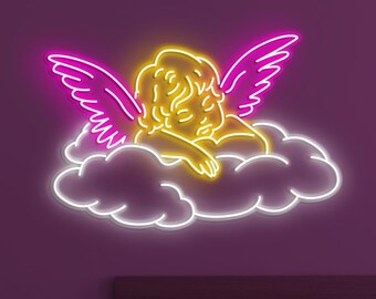 May include: A neon sign depicting a cherub on a cloud. The cherub is yellow, with pink wings, and sits on a white cloud. The sign is mounted on a purple wall above a bed with pillows.