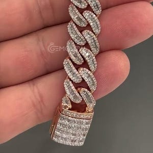 Front display of fully iced out Cuban chain bracelet, baguette diamond links creating a dazzling hip hop luxury look for men’s urban jewelry style. VVS Moissanite Cuban Link Bracelet, Cuban Bracelet With GB Lock, Rapper Miami Cuban Chain Bracelet, BustDown Cuban Bracelet, Iced Out Hip Hop Miami Cuban Bracelet, Rose Gold Plated Men's Gift Bracelet, Baguette Box Lock Bracelet, Bling Rapper Jewelry, Halo Hip Hop Bracelet, Miami Cuban Link Bracelet, Bracelet For Men, Anniversary Gift for Him