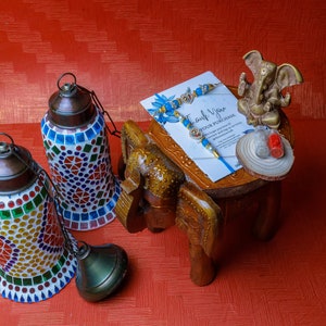 Handcrafted Rakhi Gift Hampers: Mosaic Hanging Lamps, Elephant Wooden Stool, Rakhis & Ganesh Statue A Perfect Blend of Art and Tradition image 1
