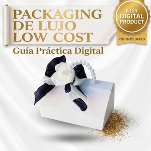 May include: A white gift box with a black and white ribbon, a white fabric flower, and a string of white faux pearls. The text reads PACKAGING DE LUJO LOW COST Guía Práctica Digital and a gold seal says ETSY DIGITAL PRODUCT PDF INMEDIATO.