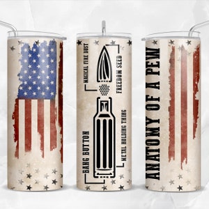 May include: A white tumbler with a red, white, and blue American flag design. The tumbler has a black and white illustration of a bullet with the text "Anatomy of a Pew" and "Bang Button", "Magical Fire Dust", "Metal Holding Thing", and "Freedom Seed".