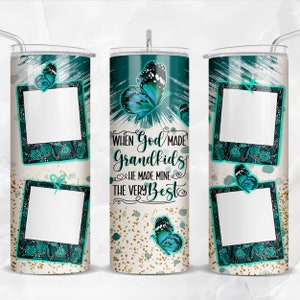 May include: A white tumbler with a teal and gold design. The tumbler features butterflies, glitter, and the text "When God made Grandkids He made mine the very best".