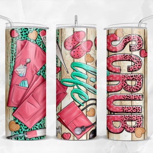 May include: Three stainless steel tumblers with a pink and green design. The tumblers feature a scrub life design, a scrub life design with a stethoscope and a scrub life design with a leopard print.