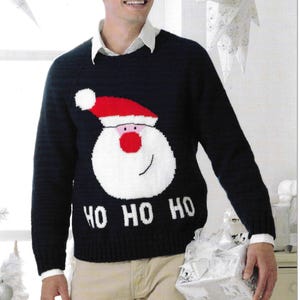 May include: A black knitted jumper with a white Santa Claus design and the text "HO HO HO" on the front.