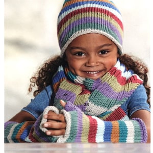 May include: A child wearing a striped knit hat, scarf, and fingerless gloves in shades of purple, green, red, orange, and white. The hat, scarf, and gloves are all made with the same yarn.
