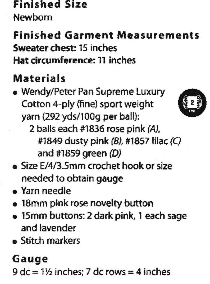 May include: A printed page detailing a newborn crochet project. It lists measurements, including a 38 cm sweater chest and a 28 cm hat circumference. Materials include yarn, buttons, and a crochet hook. Gauge details are also provided.