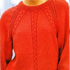 May include: A red crew neck raglan sweater with cable and eyelet detail. SIZES: 6 - 20