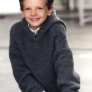 May include: A grey hooded sweater with a button fastening. The sweater is knitted with a textured stitch.