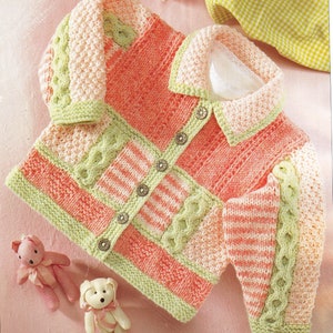 May include: A knitted baby cardigan with a green, pink and white striped pattern. The cardigan has a button fastening and a collar.