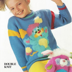 May include: A blue knitted sweater with a yellow stripe and a colorful cartoon character on the front. The sweater has red stripes on the sleeves. "DOUBLE KNIT" is written on the bottom of the image.