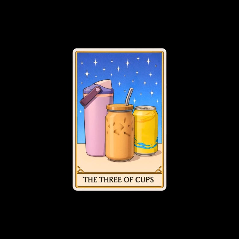 May include: A tarot card illustration featuring a pink water bottle, a glass of iced coffee with a straw, and a yellow can. The background is a blue night sky with stars. The text "THE THREE OF CUPS" is at the bottom.