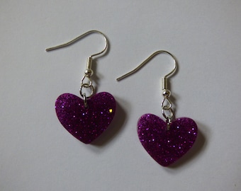 Purple glittery resin heart earrings