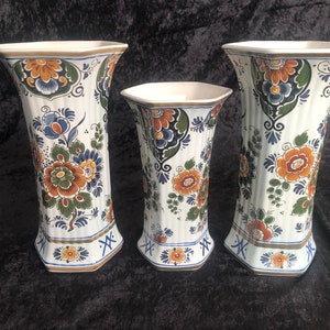 Antique hand-painted Delft earthenware vases.