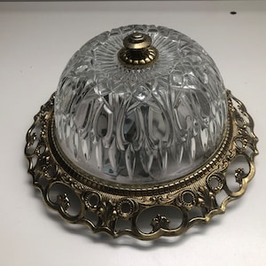 Classic vintage ceiling lamp with brass ring and pressed glass shade