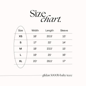 May include: Size chart for Gildan 5000b baby tee shirts. The chart shows sizes XS through XL with corresponding width, length, and sleeve measurements in inches.