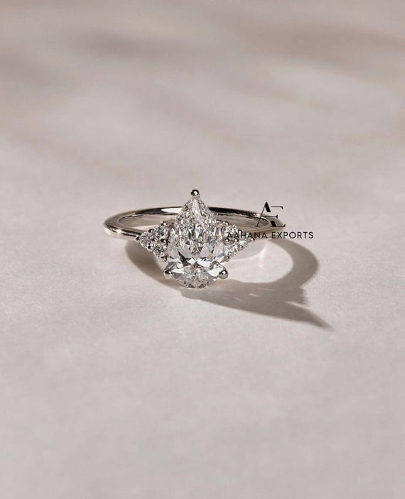 2 CT pear cut lab Grown Diamond Ring, Pear Cut Engagement Ring, Bridal Lab Grown Ring with Small Round Diamond on Shank, Best gift for her.