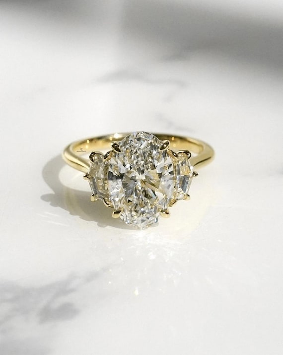 3.00 Carat E-F Color VS1 Clarity Oval Cut IGI Certified Lab Grown Diamond Three Stone Engagement Ring Side Cadillac 18k Yellow Gold For Her.