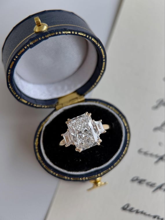 5 Carat Tulip Setting IGI Certified Radiant Cut Three Stone Lab Grown Diamond Engagement Ring, Side Trapezoids 18k Yellow Gold Euro Shank