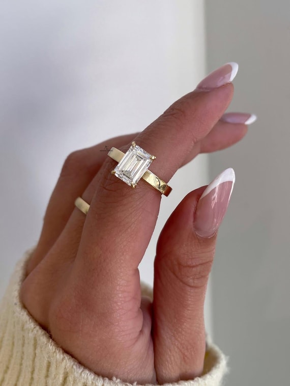3.00 CT Emerald Cut Lab-Grown Solitaire,14k Solid Yellow Gold, Engagement Ring, Hidden Halo, Cathedral Band, 2.50mm Band In Fashion for Her.