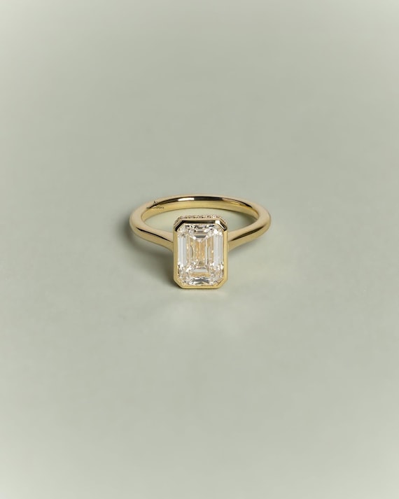 2 CT Emerald Cut Lab-Grown Solitaire Ring, 14K Yellow Gold Engagement Ring, Bezel Setting, Statement Ring, Hidden Halo Anniversary Ring.