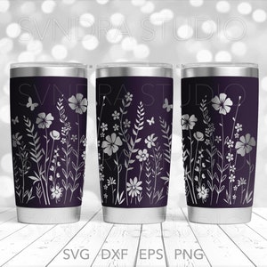 May include: Three stainless steel tumblers with a dark purple background and a white floral design. The design features various flowers, leaves, and butterflies.